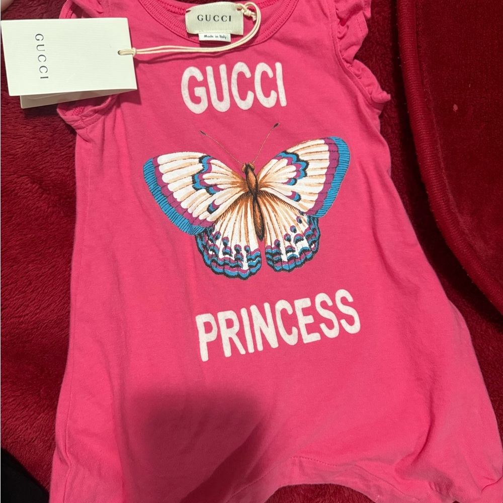 Gucci Pink romper with Butterfly Design